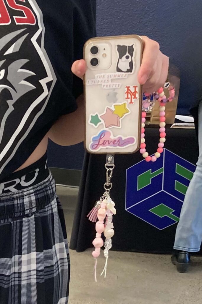 Pink kawaii beaded elements added to an existing phone case for a personalized look. phone charm, phone tab charm 